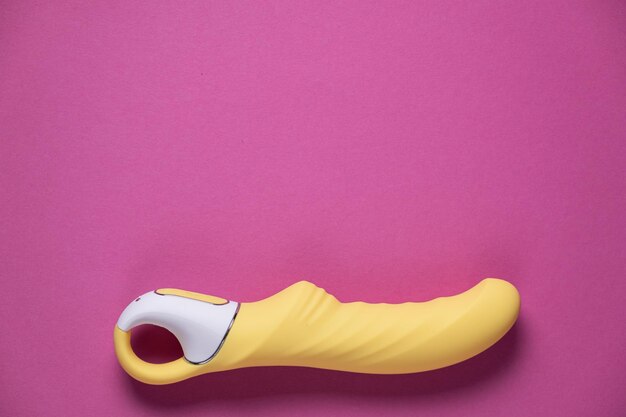 Sex toys Many vibrators on a bright background Useful for adult and sex shop