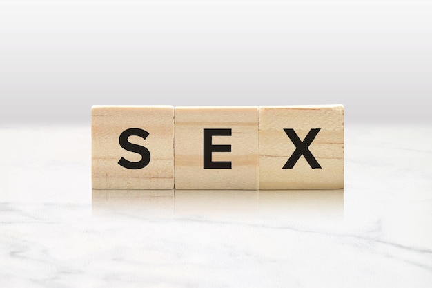 Photo sex on wooden blocks sex education concept