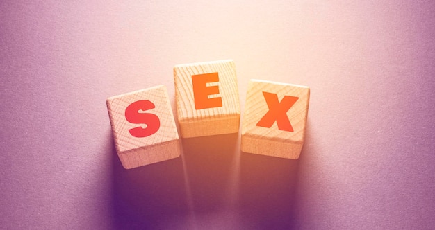 Photo sex word written on wooden cubes