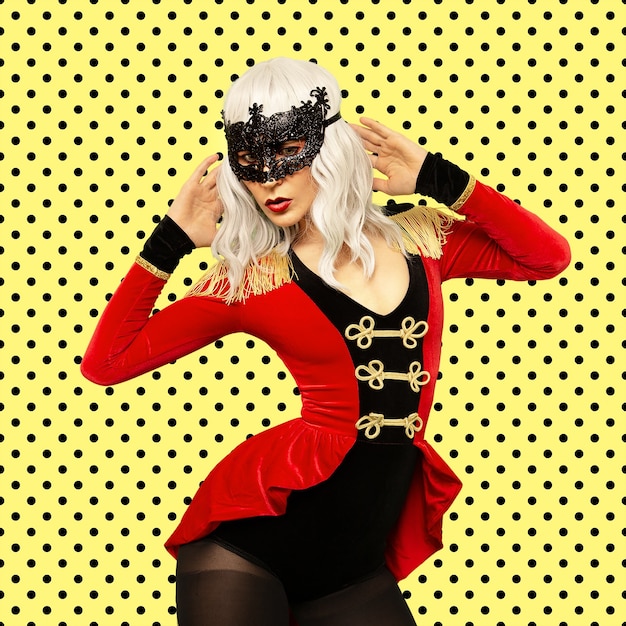 Sexy blonde in a fancy dress musketeer. New year party concept