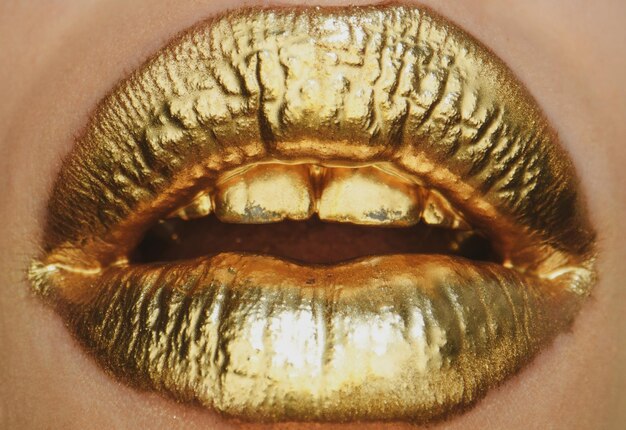 Sexy girl golden lips gold mouth glowing gold skin makeup glitter metallic shine golden lipgloss mak