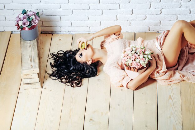 Sexy girl with roses and apple