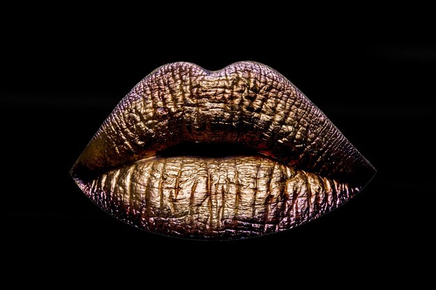 Sexy golden metallized female lips