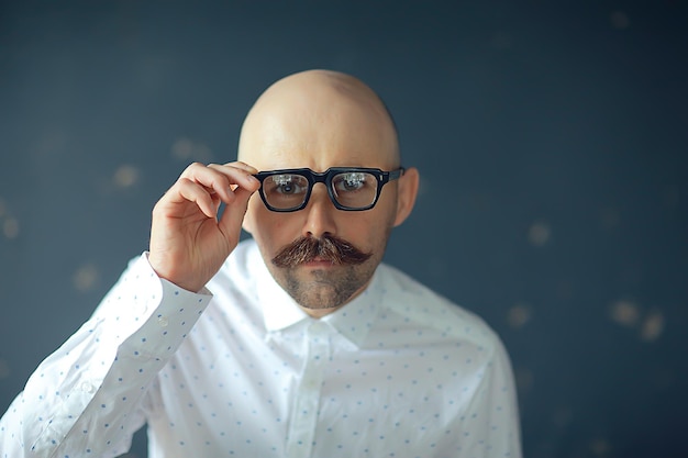 sexy macho with a mustache, freak, unusual portrait of a hipster guy