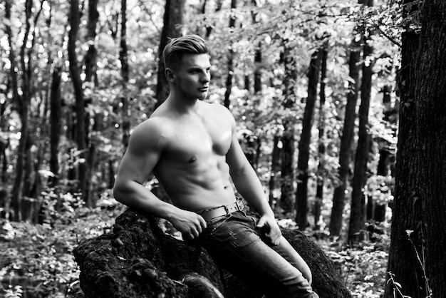 Sexy male bare torso outdoor Handsome masculine man Muscular guy with sexy perfect naked body