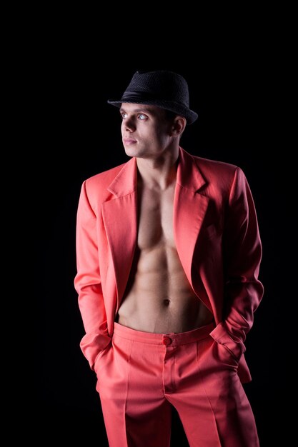 Sexy man in red suit