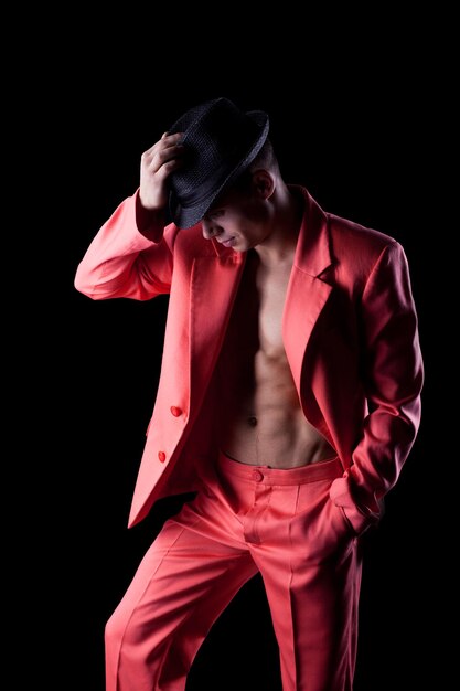 Sexy man in red suit