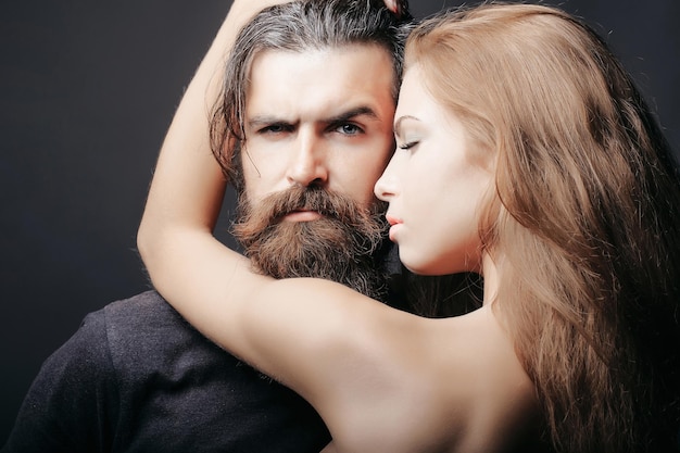 Sexy man and woman embracing