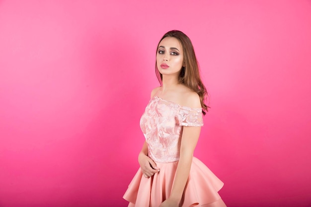 Sexy woman on pink background