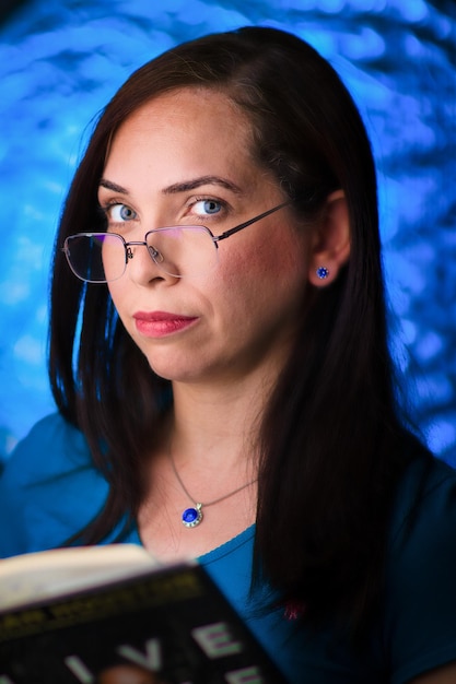 Sexy woman reading a book