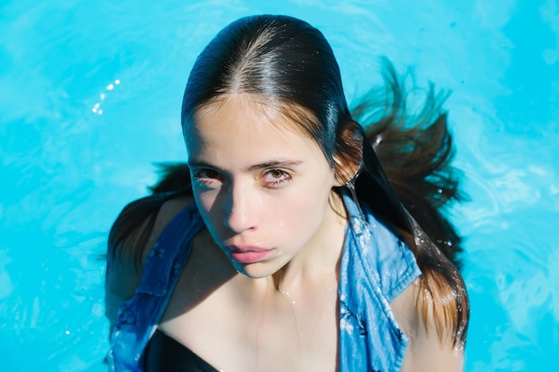 Sexy woman in swimming pool