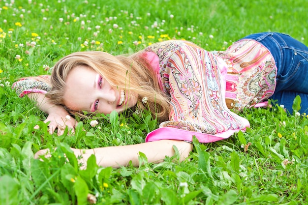 Sexy young woman in a meadow