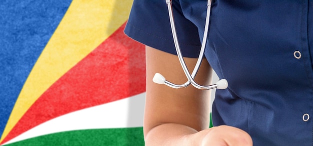 Seychelles flag female doctor with stethoscope, national healthcare system