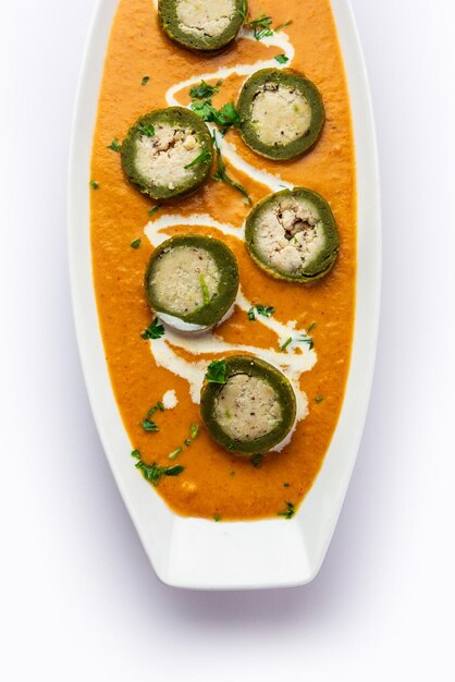 Shaam Savera is a spinach kofta curry where stuffing is made from paneer and the kofta made from spinach