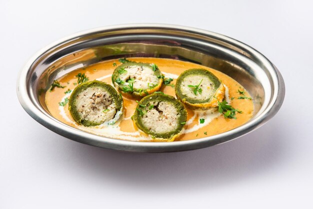 Photo shaam savera is a spinach kofta curry where stuffing is made from paneer and the kofta made from spinach