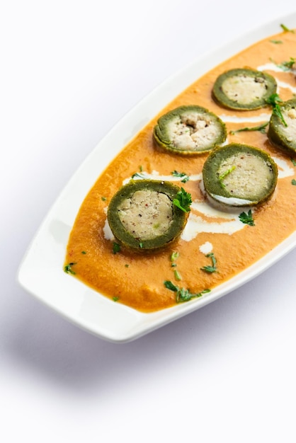 Photo shaam savera is a spinach kofta curry where stuffing is made from paneer and the kofta made from spinach