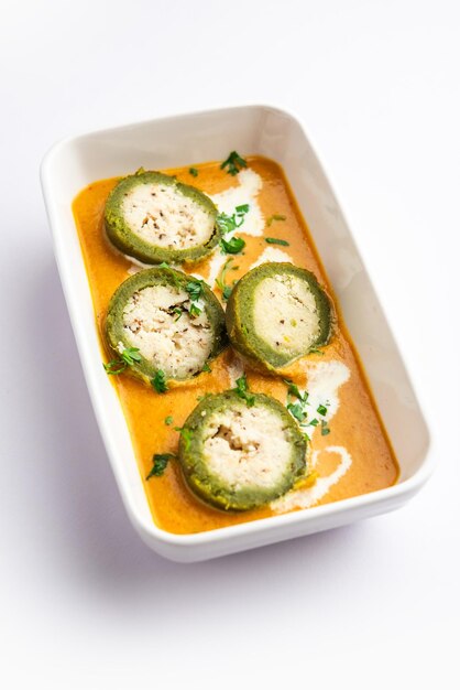 Photo shaam savera is a spinach kofta curry where stuffing is made from paneer and the kofta made from spinach