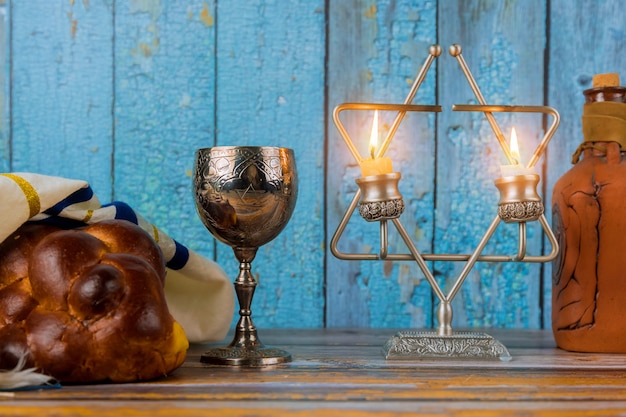 Shabbat with challah bread on a wooden table