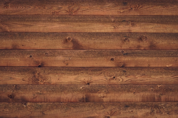 Shabby brown wooden boards. Plank wood texture. Vintage oak dirty fence, table. Grunge flooring texture background.