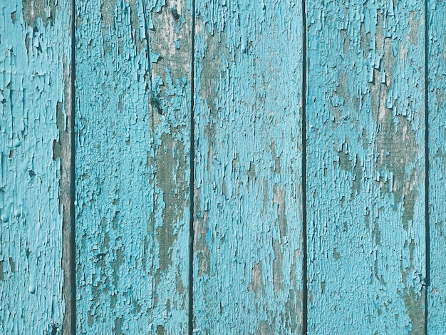 Shabby old flaky wooden background.