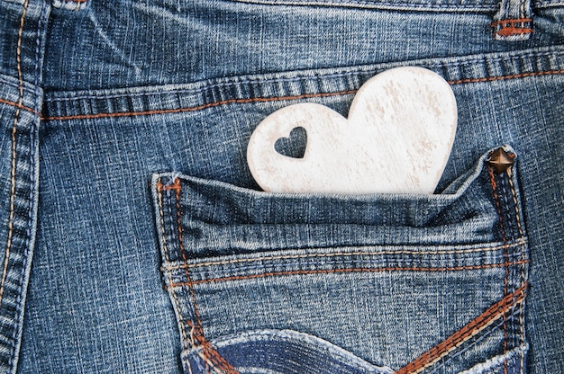 Shabby wooden heart in pocket