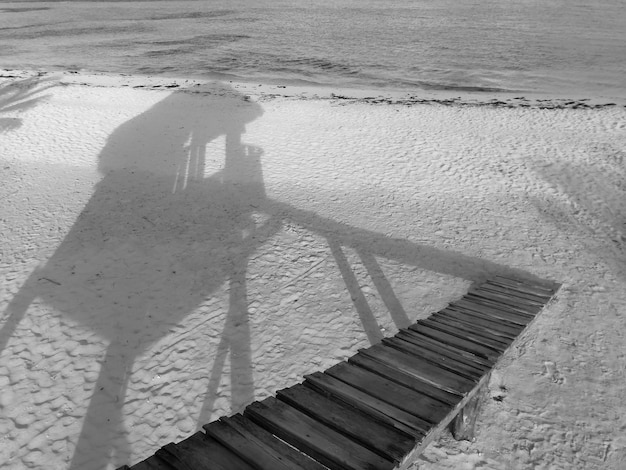 Photo shadow in beach and ladder