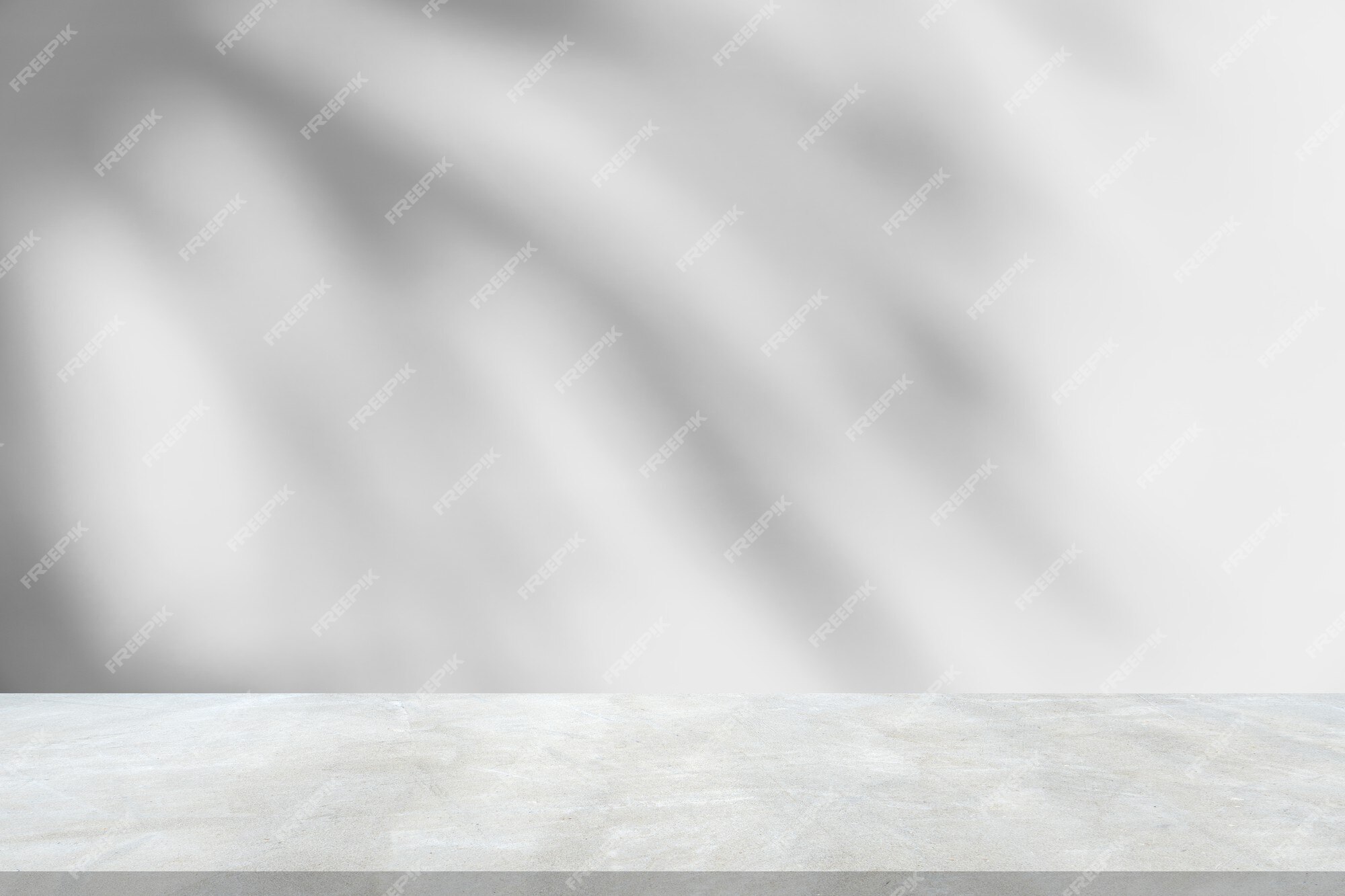 Premium Photo | Shadow leaves on white wall background and gray floor  cement well editing display products and text