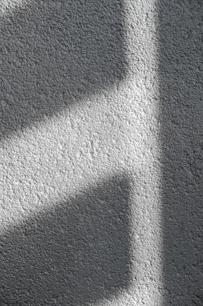 Shadow and light through blinds window on tiled wall Morning light and shadow on the wall