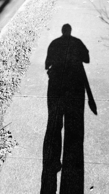 Photo shadow of man on wall