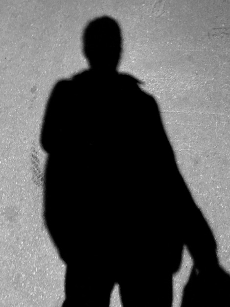 Photo shadow of man on wall