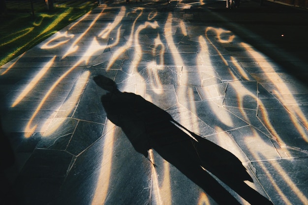 Photo shadow of person on street