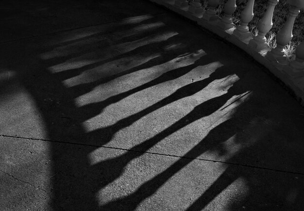 Photo shadow of railing on floor