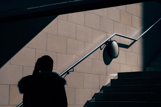 Photo shadow of woman on wall