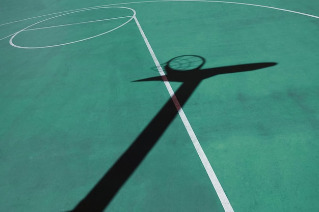 shadows on the green street basket court green background