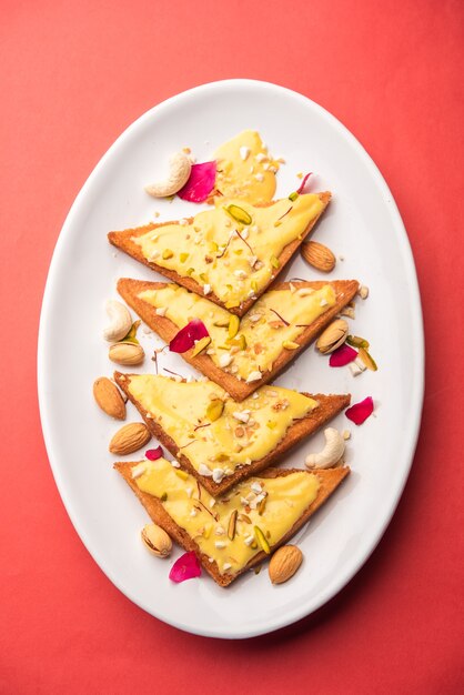 Shahi tukda or tukra also known as double ka meetha is a rich &amp; festive Indian dessert made with bread, ghee, sugar, milk and nuts