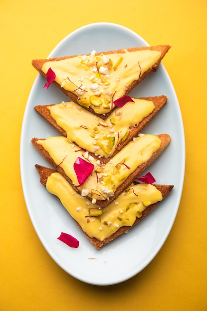 Shahi tukda or tukra also known as double ka meetha is a rich &amp; festive Indian dessert made with bread, ghee, sugar, milk and nuts