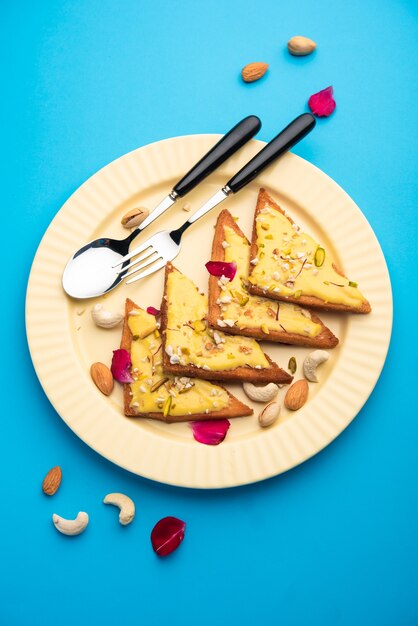 Shahi tukda or tukra also known as double ka meetha is a rich &amp; festive Indian dessert made with bread, ghee, sugar, milk and nuts