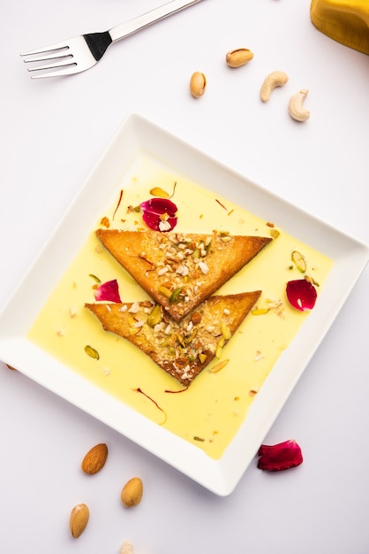 Shahi tukda or tukra also known as double ka meetha is a rich &amp; festive Indian dessert made with bread, ghee, sugar, milk and nuts