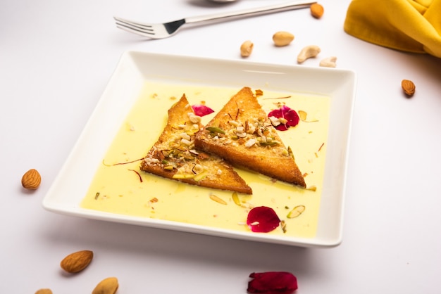 Shahi tukda or tukra also known as double ka meetha is a rich &amp; festive Indian dessert made with bread, ghee, sugar, milk and nuts