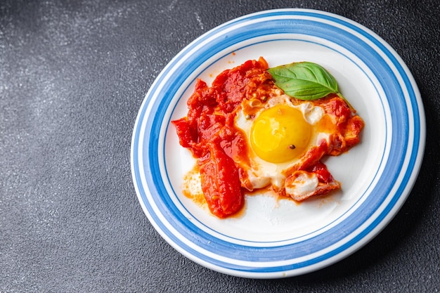 shakshuka eggs, tomato, pepper, vegetables breakfast healthy meal food snack diet on the table copy