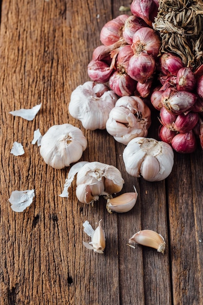 shallots with garlic on wooden table