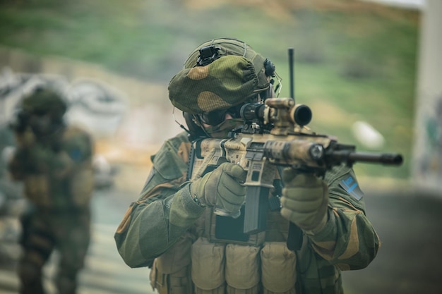 Shallow focus of a group of special force soldiers investigating an abandoned area