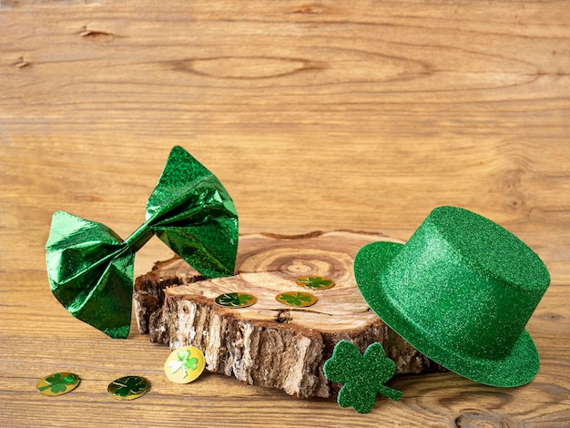 Shamrock clover and green hat on a wooden table a symbol of the Irish holiday of St Patricks Day