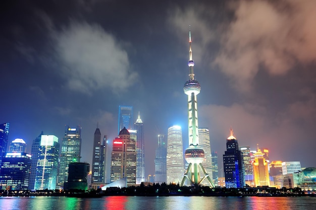 Shanghai city skyline at night over Huangpu river