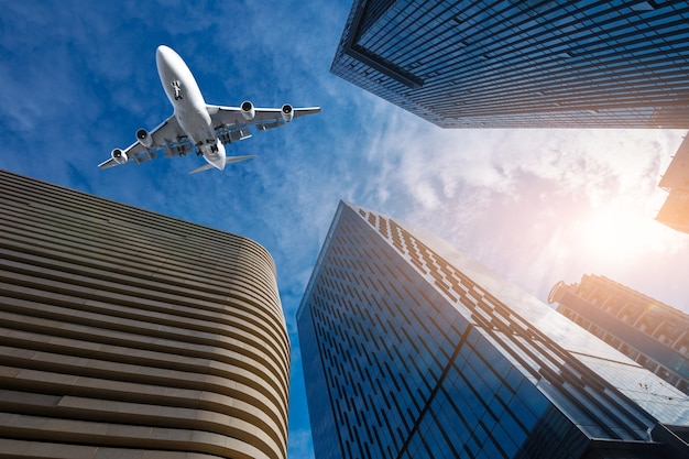 Shanghai&#39;s skyscrapers and airplanes on sky