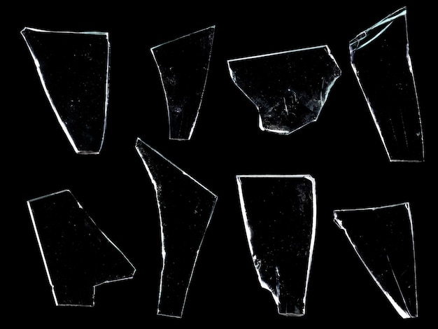 Photo shards of glass isolated on a black background. high quality photo