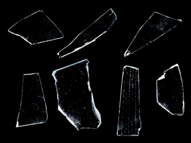 Shards of glass isolated on a black background. High quality photo