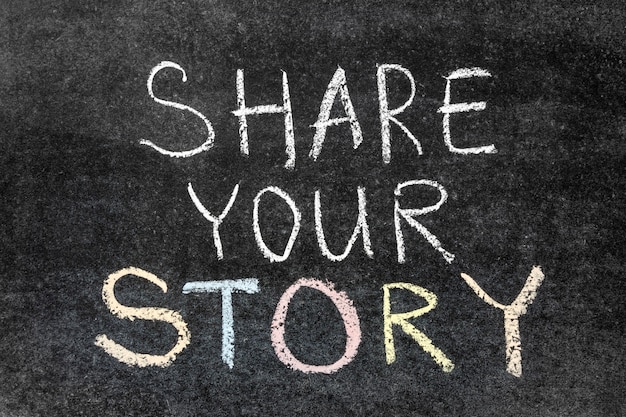 Share your story phrase handwritten on the school blackboard