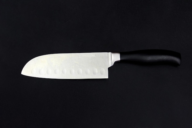 Sharp chef knife on black high quality stainless steel plastic handle