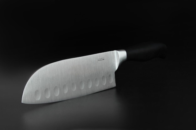Sharp chef knife on black high quality stainless steel plastic handle